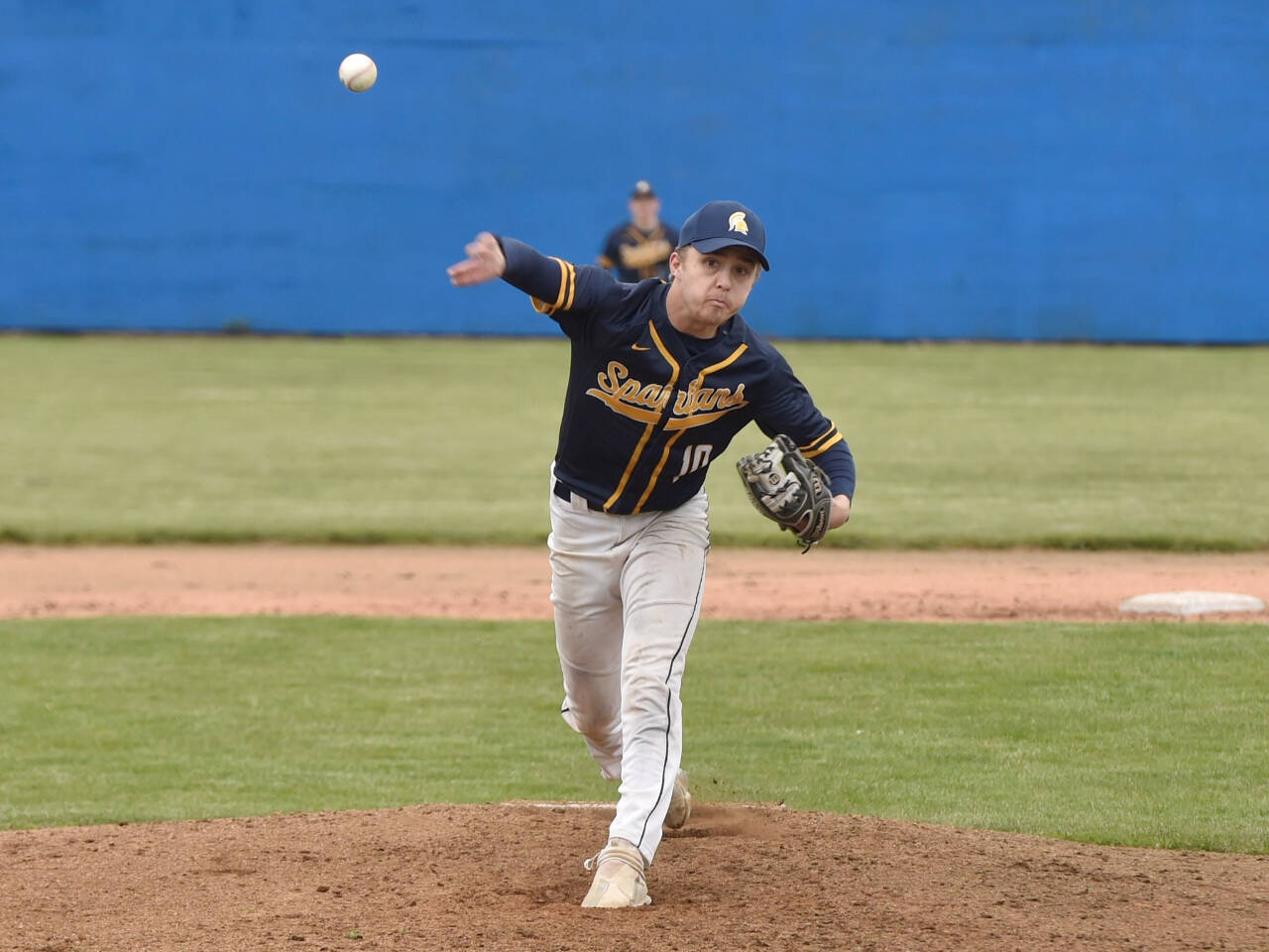 Forks’ Logan Olson pitches a shutout against Ilwaco in the Southwest 2B district tournament Friday. Olson finished with nine strikeouts in a 7-0 win. (Jordan Nailon/Longview Daily News)