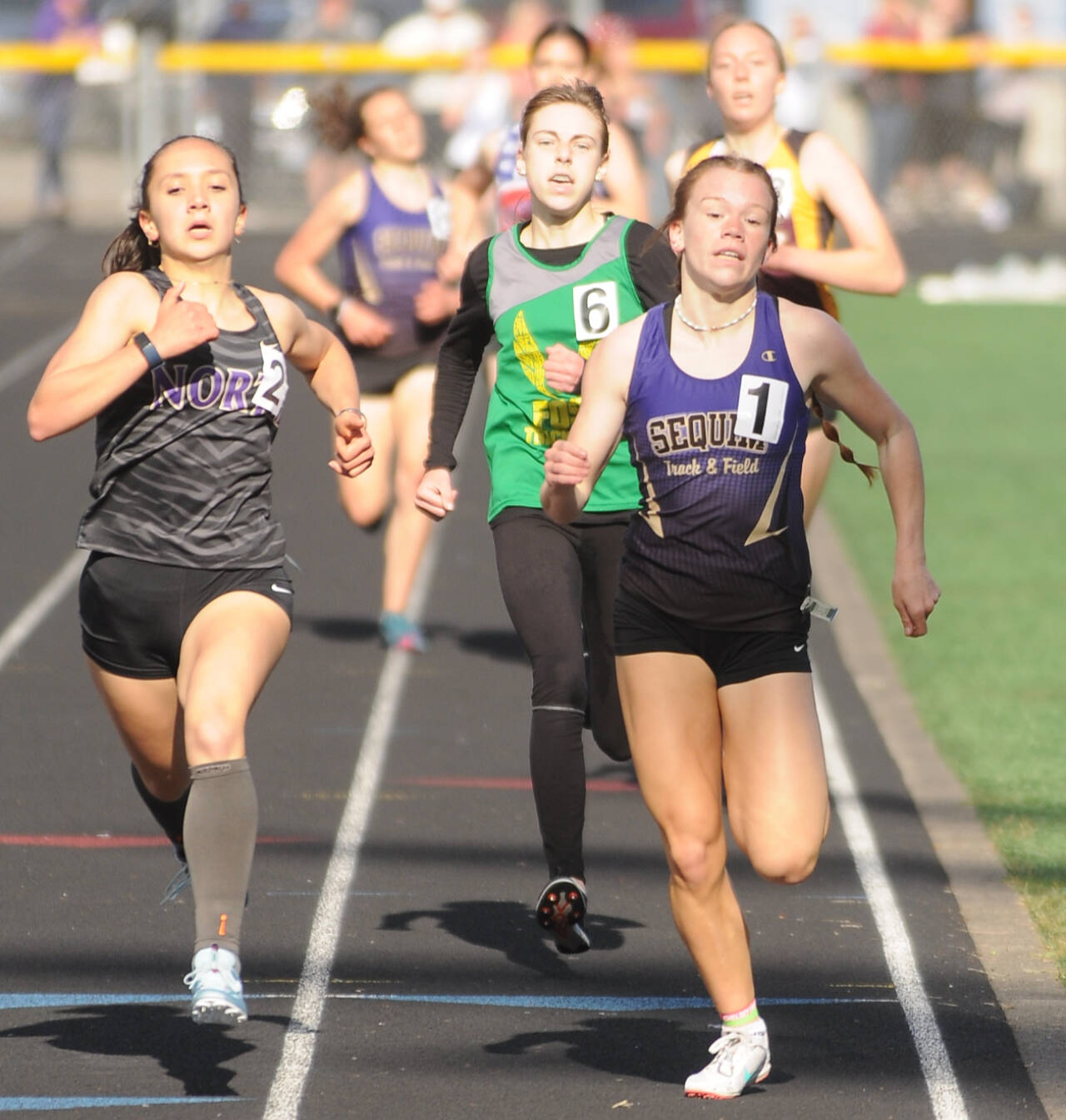 Sequim’s Riley Pyeatt (1) won the 400, 800, 1,600 and anchored the Wolves’ 4x400 girls relay team that took first at the 2A West-Central District 3 track and field meet in Belfair. (Michel Dashiell/Olympic Peninsula News Group)