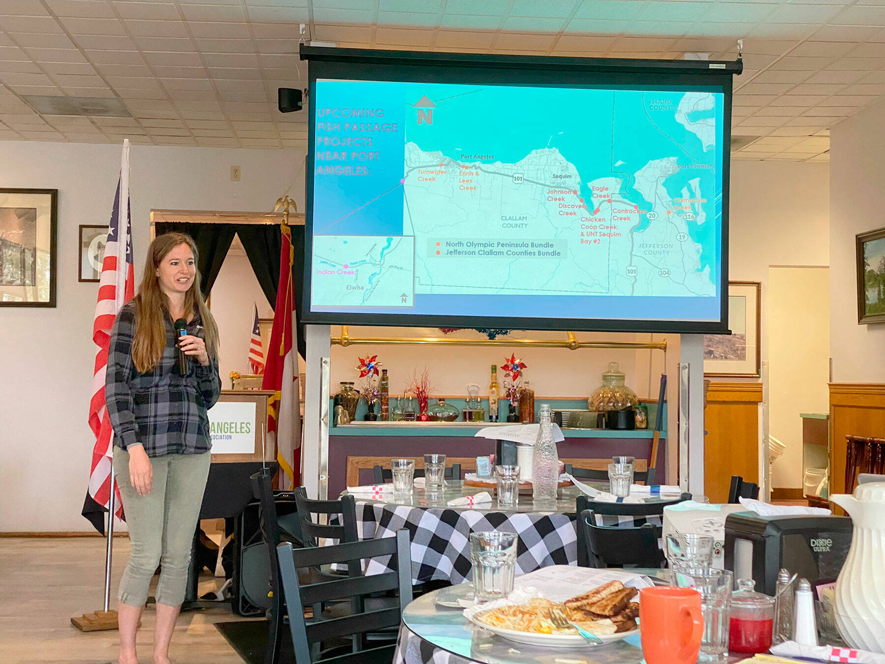 Piper Pettit, project manager for the state Department of Transportation, speaks to the Port Angeles Business Association on Tuesday about upcoming fish passage projects that will significantly impact traffic in the city. (Ken Park/Peninsula Daily News)