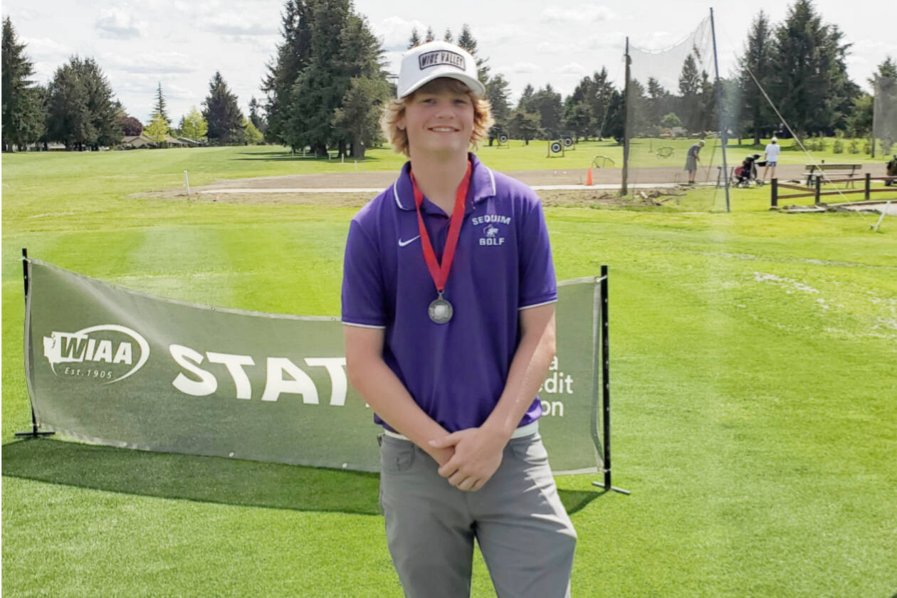 Courtesy photo
From left, Sequim's Dominic Riccogene, coach Sean O'Mera and Ben Sweet celebrate Sequim's fifth-place finish at the state 2A golf championship at the Capitol City Golf Club in Olympia.