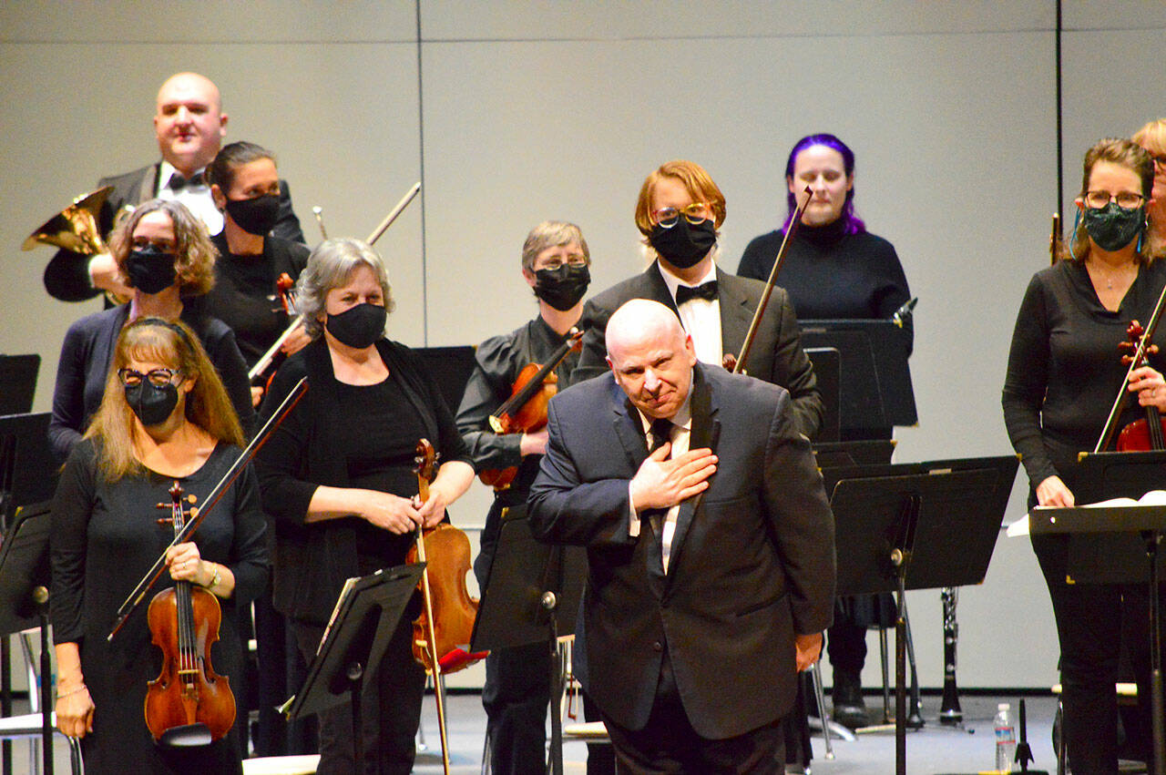 Conductor and Music Director Jonathan Pasternack bows to the audience after the Port Angeles Symphony Orchestra’s return to the stage this past season. (photo courtesy Port Angeles Symphony Orchestra)