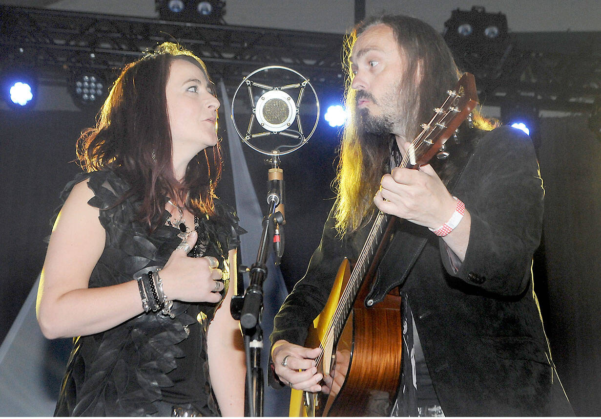 The indie folk duo The Black Feathers, Sian Chandler and Ray Hughes, who base themselves in Gloucestershire in the United Kingdom, perform on Saturday at Vern Burton Community Center during the Juan de Fuca Festival of the Arts. (Keith Thorpe/Peninsula Daily News)