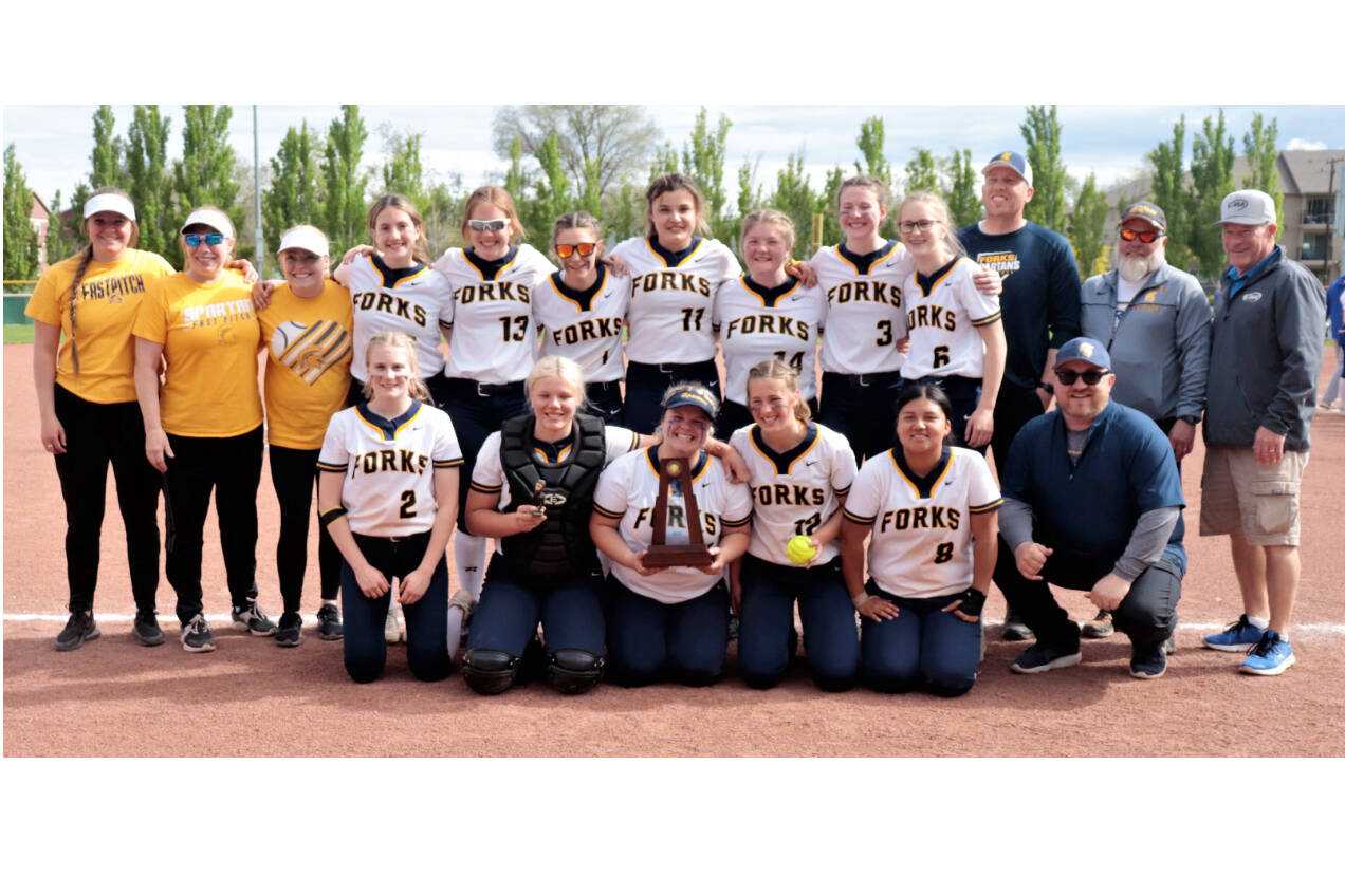 The Forks softball team celebrates its third-place trophy at the state 2B tournament held in Yakima this weekend. (Roger Harnack/Free Press Publishing)