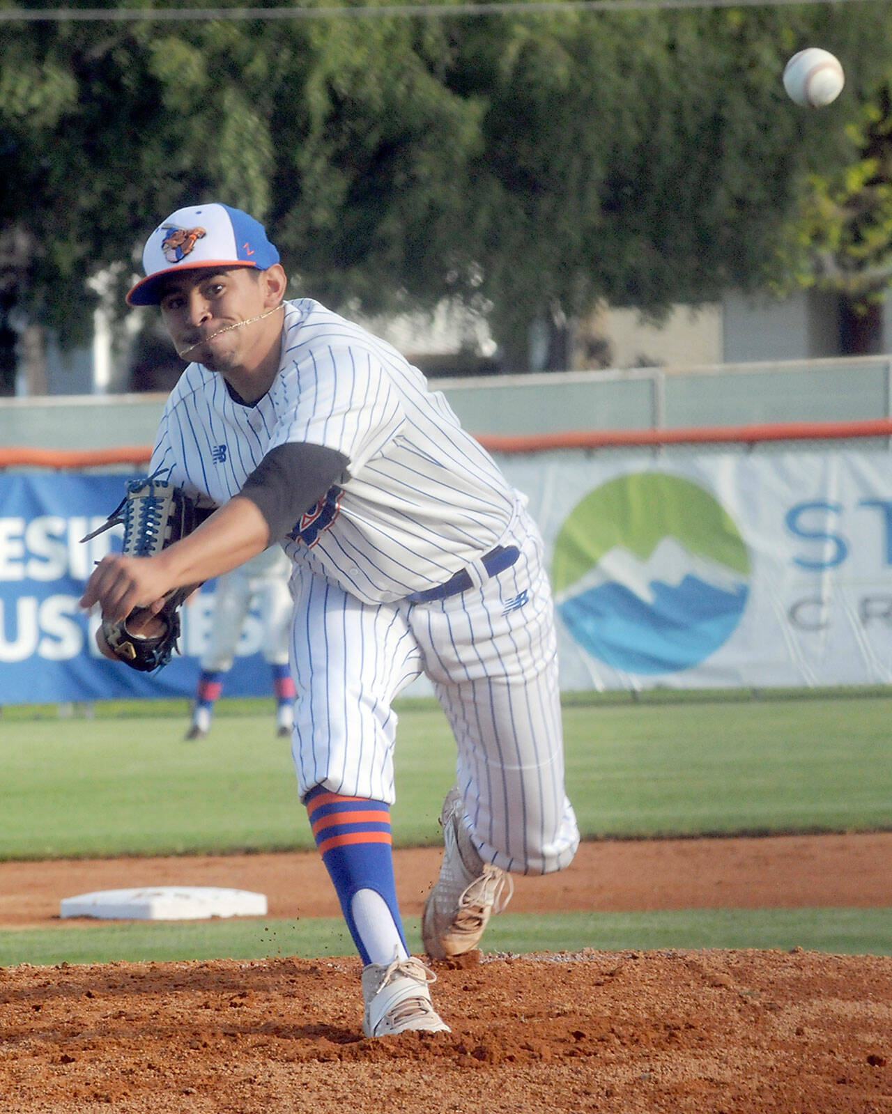 Lefties pitcher Andres Quinones throws in the first inning against Northwest on Friday in Port Angeles. (Keith Thorpe/Peninsula Daily News)
