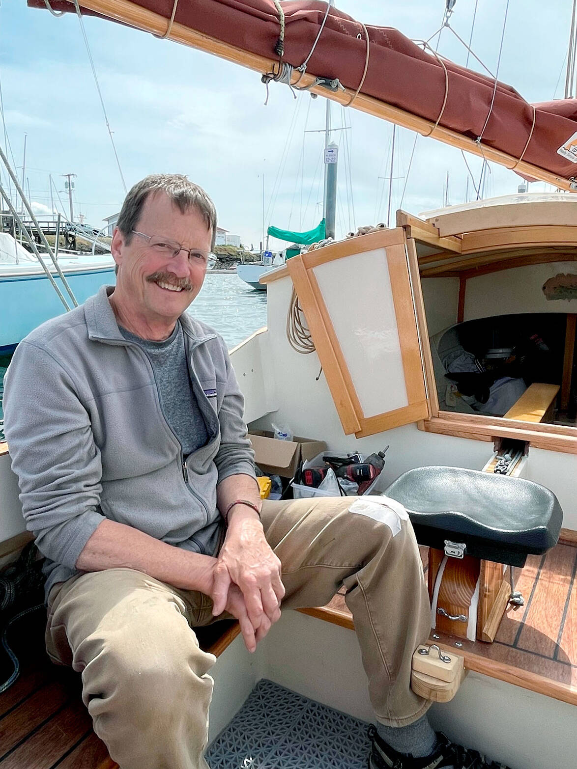 Doug Smith is a former school teacher from Talkeetna, Alaska, who built his 18-foot-long boat and named it “Dark Star” after the Grateful Dead song. He decided to enter the Race to Alaska after he lost his wife in 2019 and asked himself, “Now what do I do?” (Paula Hunt/Peninsula Daily News)