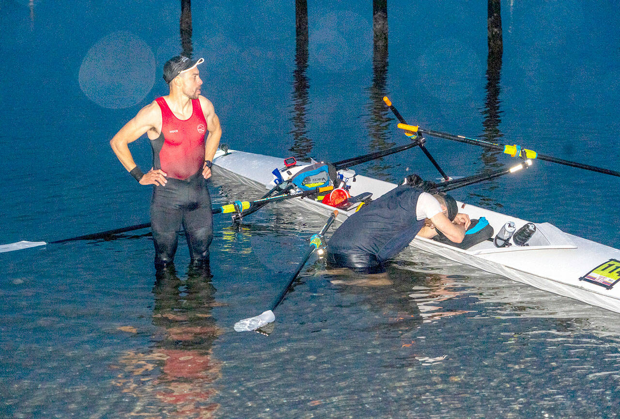 Team Imua members Thiago Silva, left, and Connor Jones, from Mill Valley, CA. pause to reflect on their 70-mile overnight row from Tacoma to Port Townsend to win the annual Seventy48 race for non-motorized watercraft. (Steve Mullensky/for Peninsula Daily News)