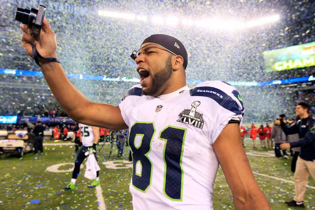 The Associated Press Golden Tate celebrates after the Seattle Seahawks won Super Bowl XLVIII in 2014. Tate, who also played baseball in college at Notre Dame, will play for the Port Angeles Lefties tonight at Civic Field.