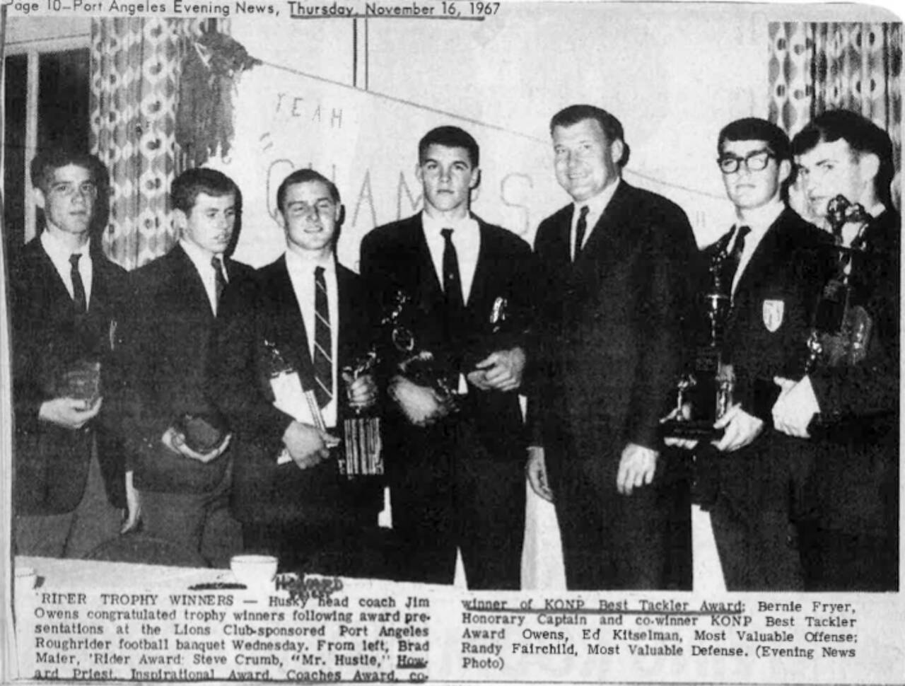 Leaders of the unbeaten 1967 Roughriders football team receive honors.