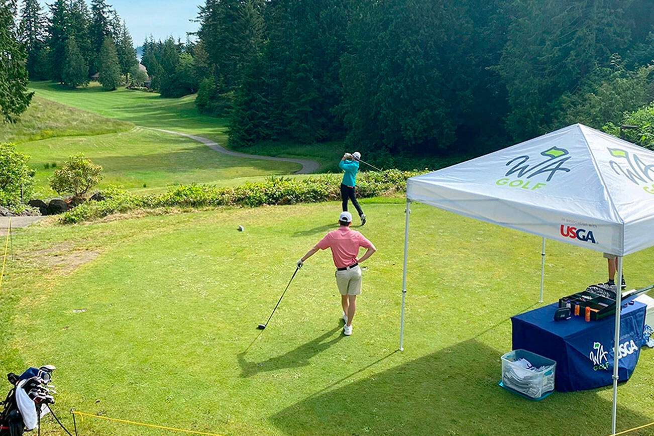 Courtesy WA Golf 
Golfers competing in a U.S. Junior Amateur Qualifier tee off on the first hole at Port Ludlow Golf Course on Tuesday.