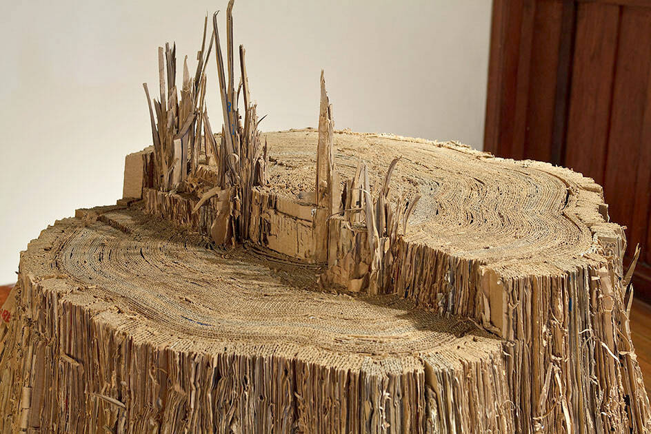 Tree stumps made of cardboard and other creations by Karne Rudd are on view at the Jefferson Museum of Art & History.