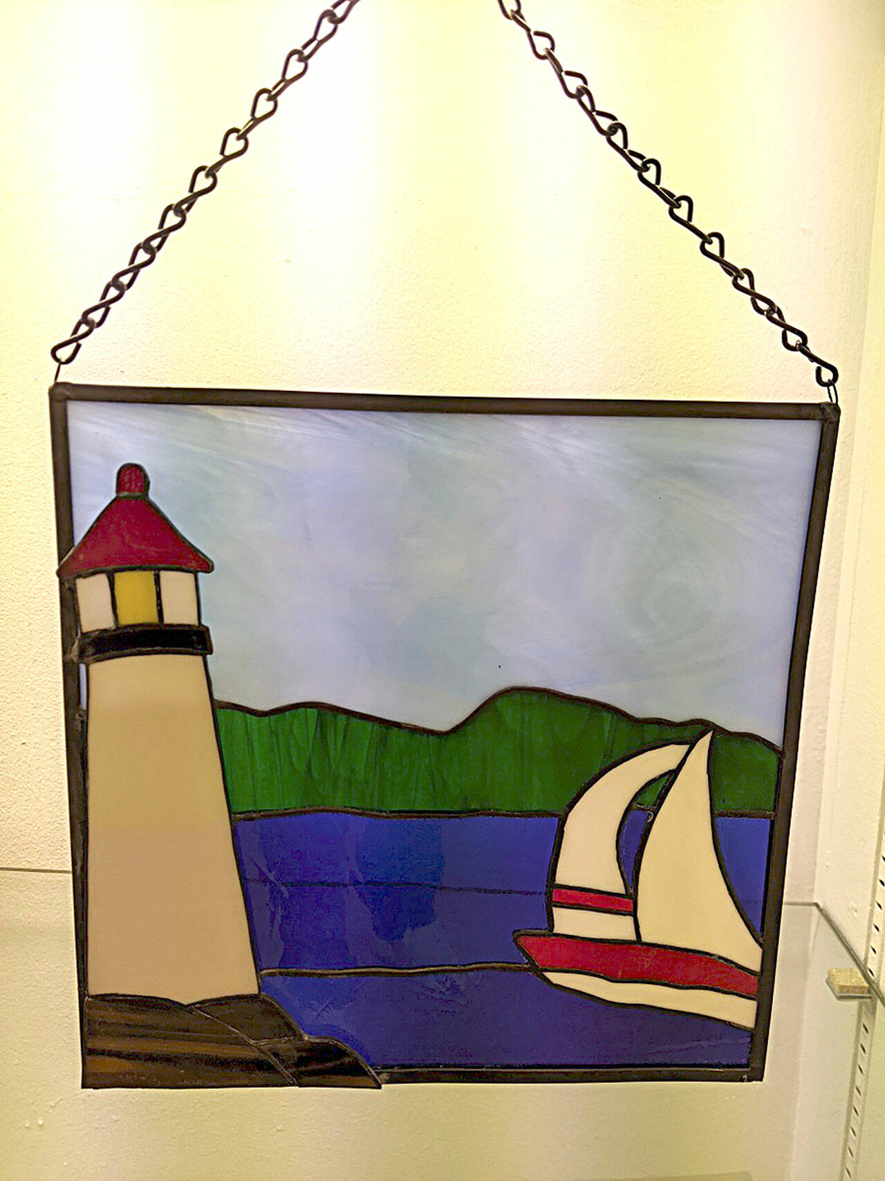 June Echternkamp is one of the featured artists at the Blue Whole Gallery in July. “Sailing,” a stained glass work, is one of her many pieces on display. (Submitted photo)
