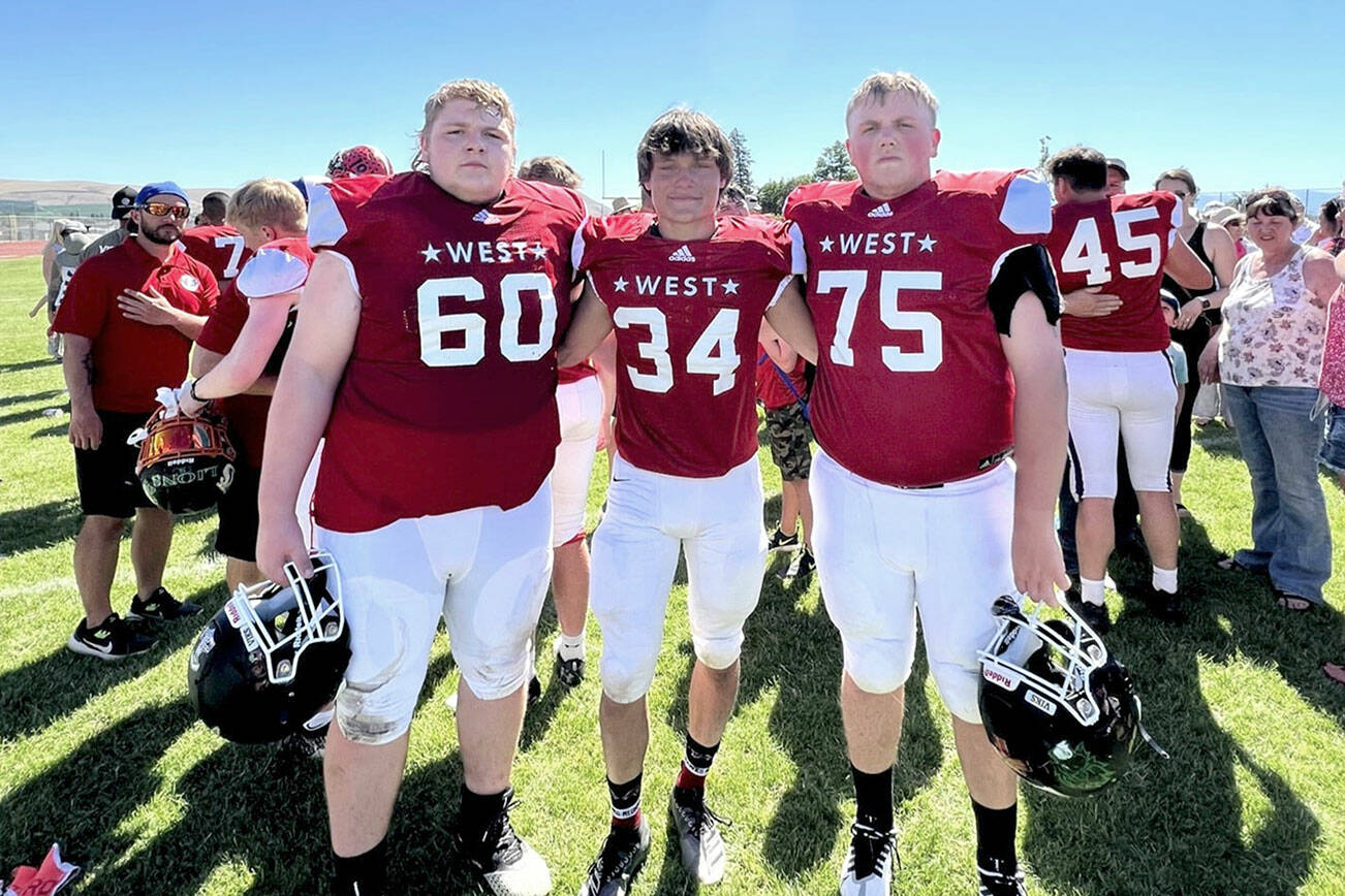 East Jefferson football players, from left, Chris Fair, Logan Massie and Marshall Graves competed for the West All-Stars in a 36-12 loss to the East in the Earl Barden All-Star Classic, the all-state football game for Class 1B through 2A schools, last Saturday in Yakima.