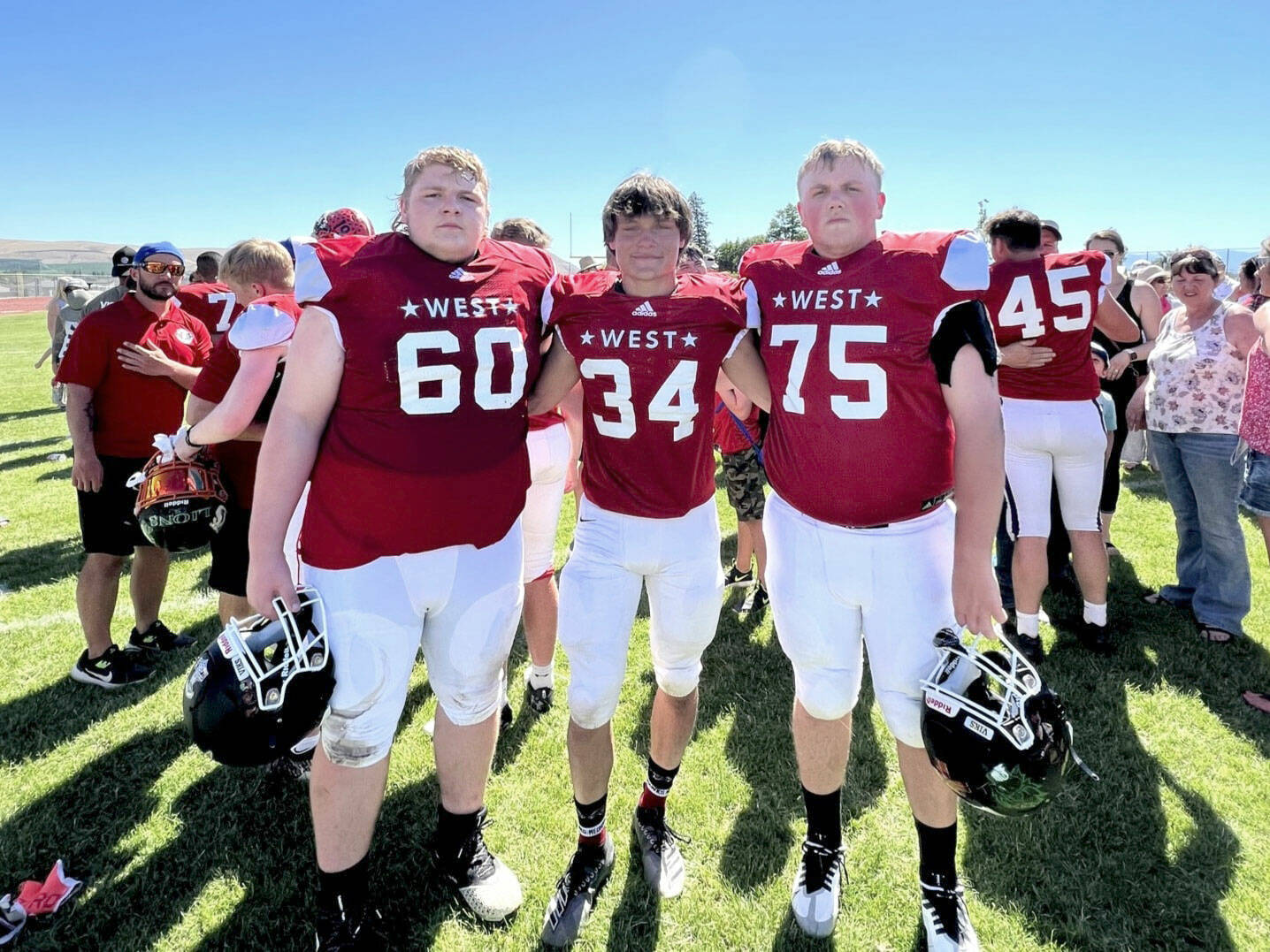 East Jefferson football players, from left, Chris Fair, Logan Massie and Marshall Graves competed for the West All-Stars in a 36-12 loss to the East in the Earl Barden All-Star Classic, the all-state football game for Class 1B through 2A schools, last Saturday in Yakima.