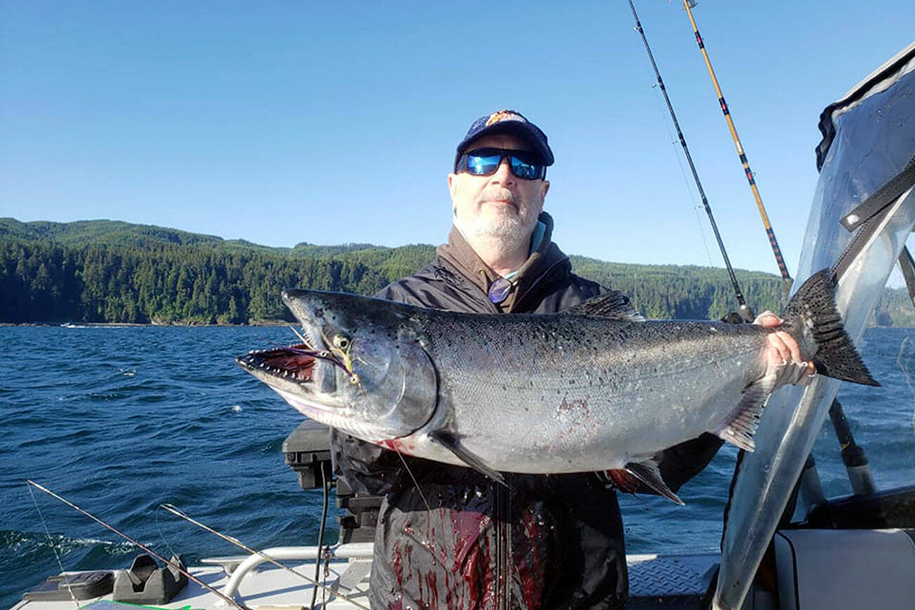 Everett's Marvin Livermont caught this king with a purple haze lure while fishing the Garbage Dump off Neah Bay. Due to high king catch estimates, the state Department of Fish and Wildlife has suspended salmon fishing beginning today east of the Bonilla-Tatoosh line and July 5 west of the line.