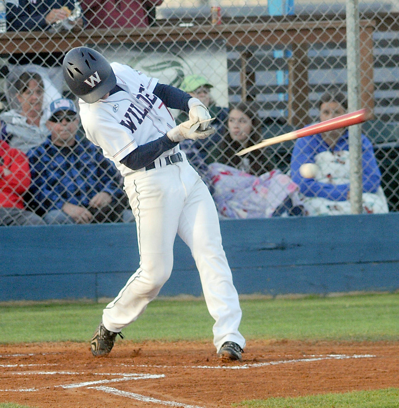 Wilder Seniors Ezra Townsend swings and breaks his bat on contact during the first inning of Saturdays game against NW Sting at Port Angeles Civic Field. (Keith Thorpe/Peninsula Daily News)
