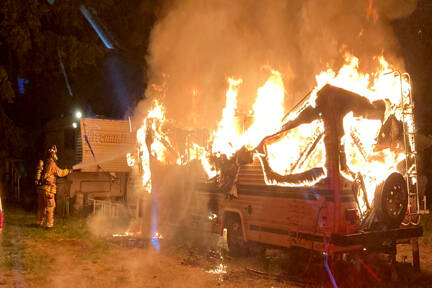 A motor home in the 11000 block of Rhody Drive burns early Thursday morning. (East Jefferson Fire Rescue)