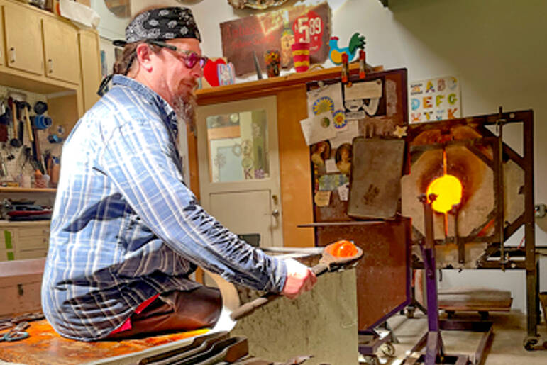 Brian Iverson works on a blown glass creation. (Port Townsend Gallery)