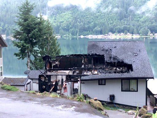 A home is left gutted by fire after an early-morning blaze said to have been accidental and likely caused by discarded fireworks that smoldered and spread. (Clallam 2 Fire Rescue)