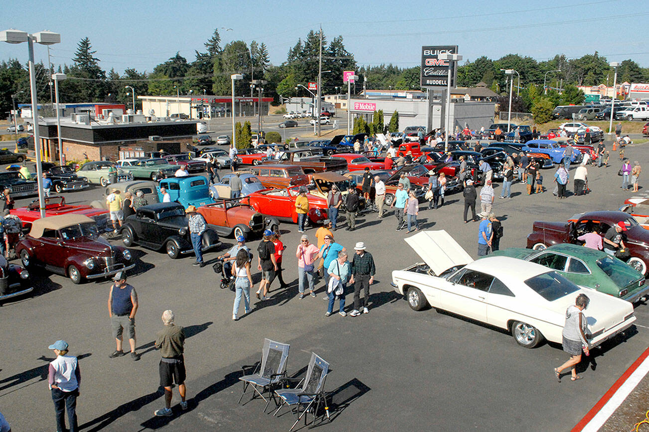 Vintage cars stand on display at the 2021 Ruddell Cruise In at Ruddell Auto Plaze in Port Angeles.(Keith Thorpe/Peninsula Daily News)
