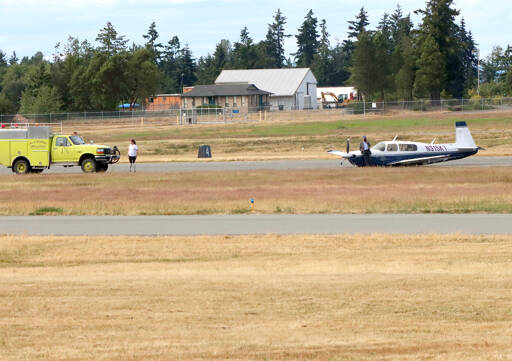 A small plane crashed at the William R. Fairchild International Airport on Sunday afternoon. No one was hurt, a bystander said. (Dave Logan/for Peninsula Daily News)