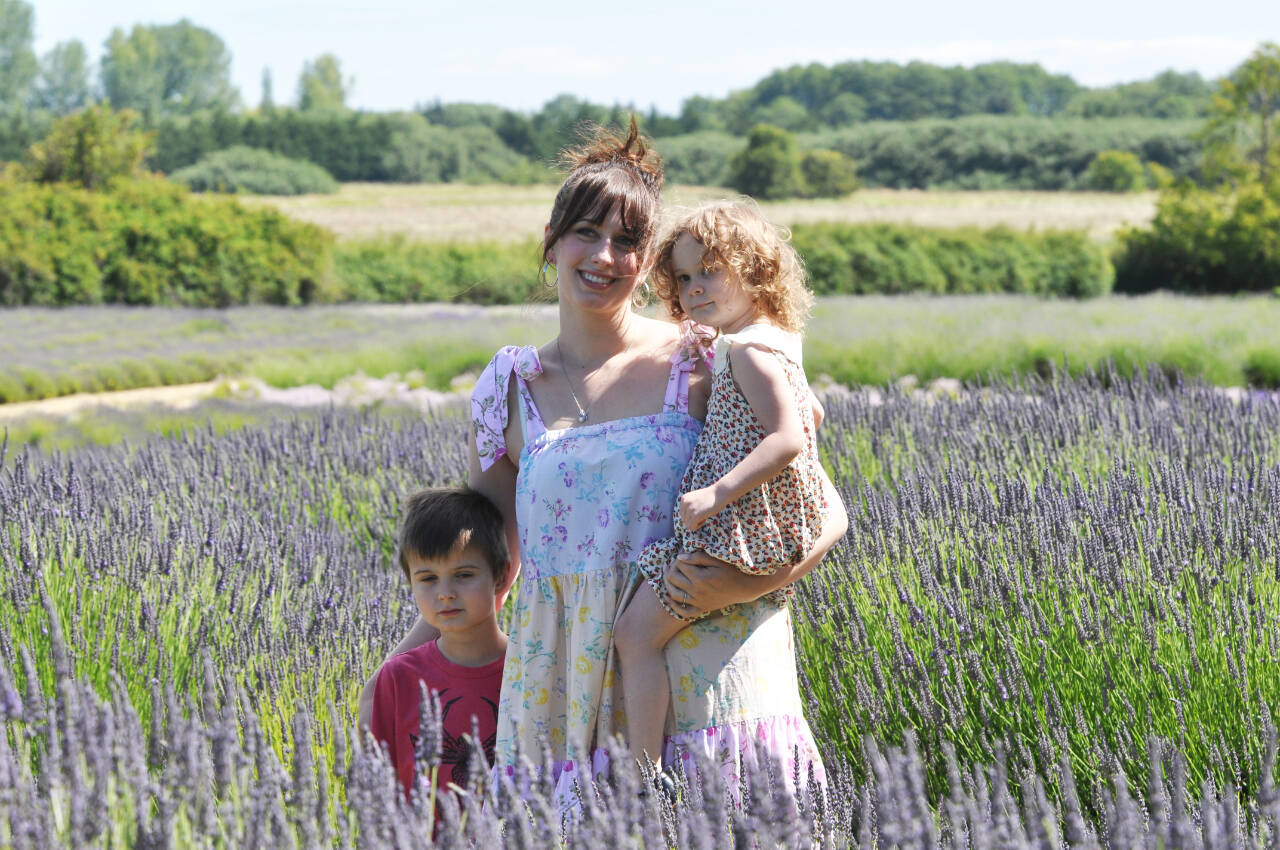 Michael Mangiameli, with Sebastian, 5, and Eleanora, 2, of Sequim enjoy a day at Jardin du Soliel Lavender Farm & Gift Shop on July 15. (Michael Dashiell/Olympic Peninsula News Group)