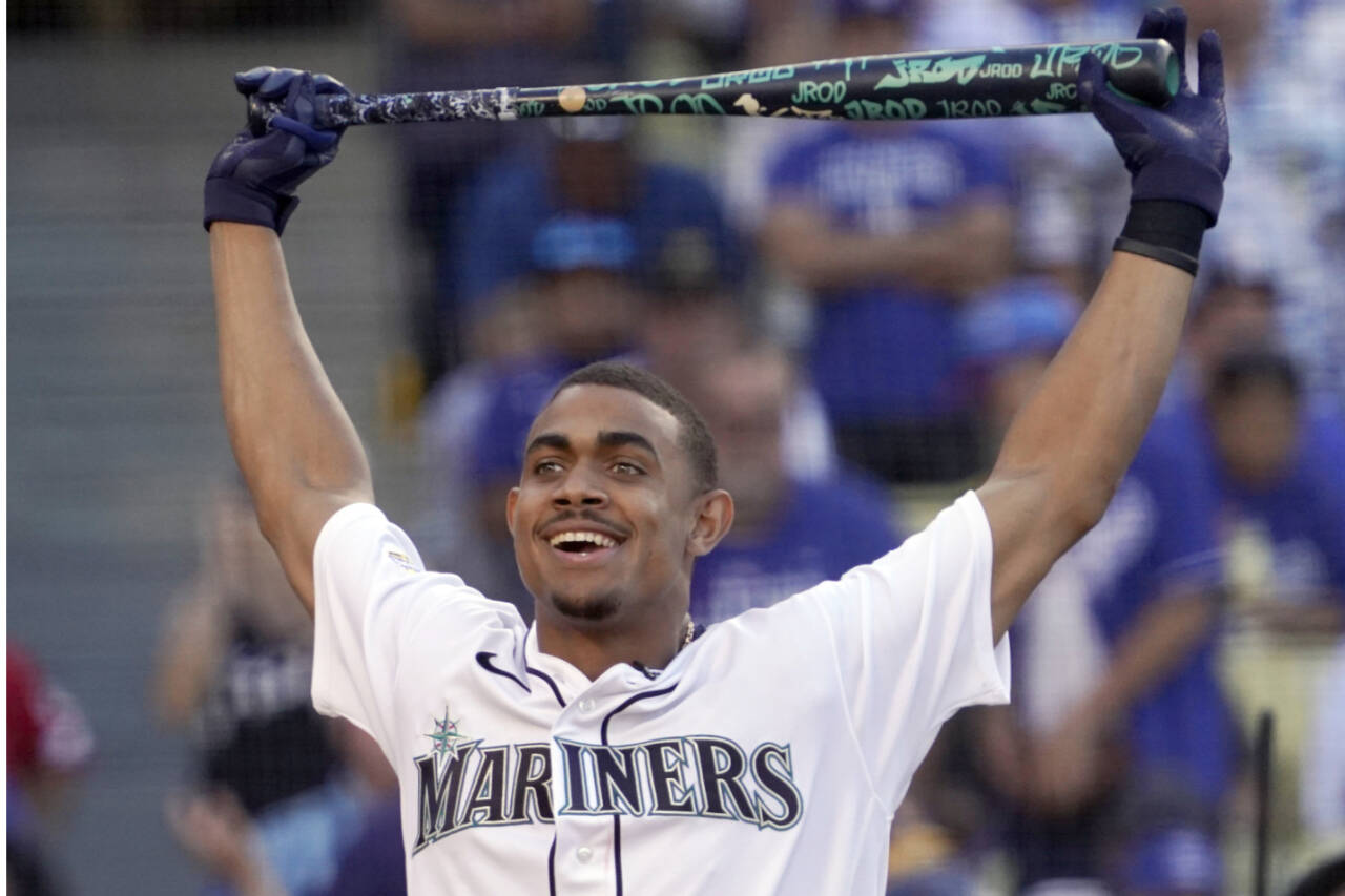 American League's Julio Rodriguez, of the Seattle Mariners, smiles during the MLB All-Star baseball Home Run Derby, Monday, July 18, 2022, in Los Angeles. (AP Photo/Mark J. Terrill)