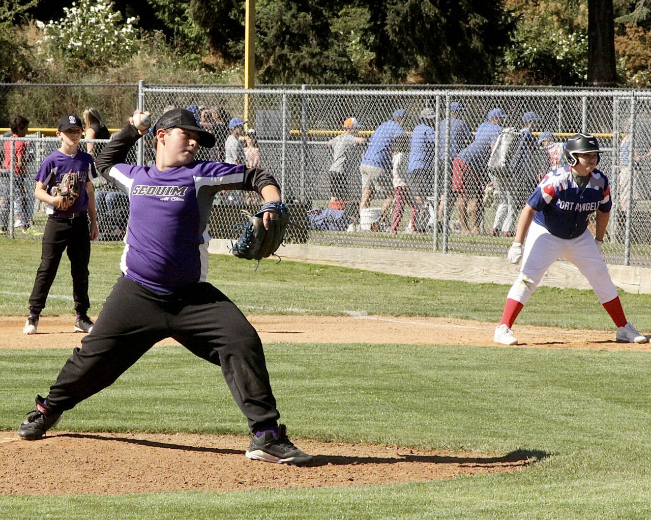 Van Johnson of the Sequim Adagio Scramming’ Beans 12-year-old team opens the 24th annual Dick Brown Memorial Baseball Tournament on Saturday against Port Angeles at Lincoln Park. (Dave Logan/for Peninsula Daily News)
