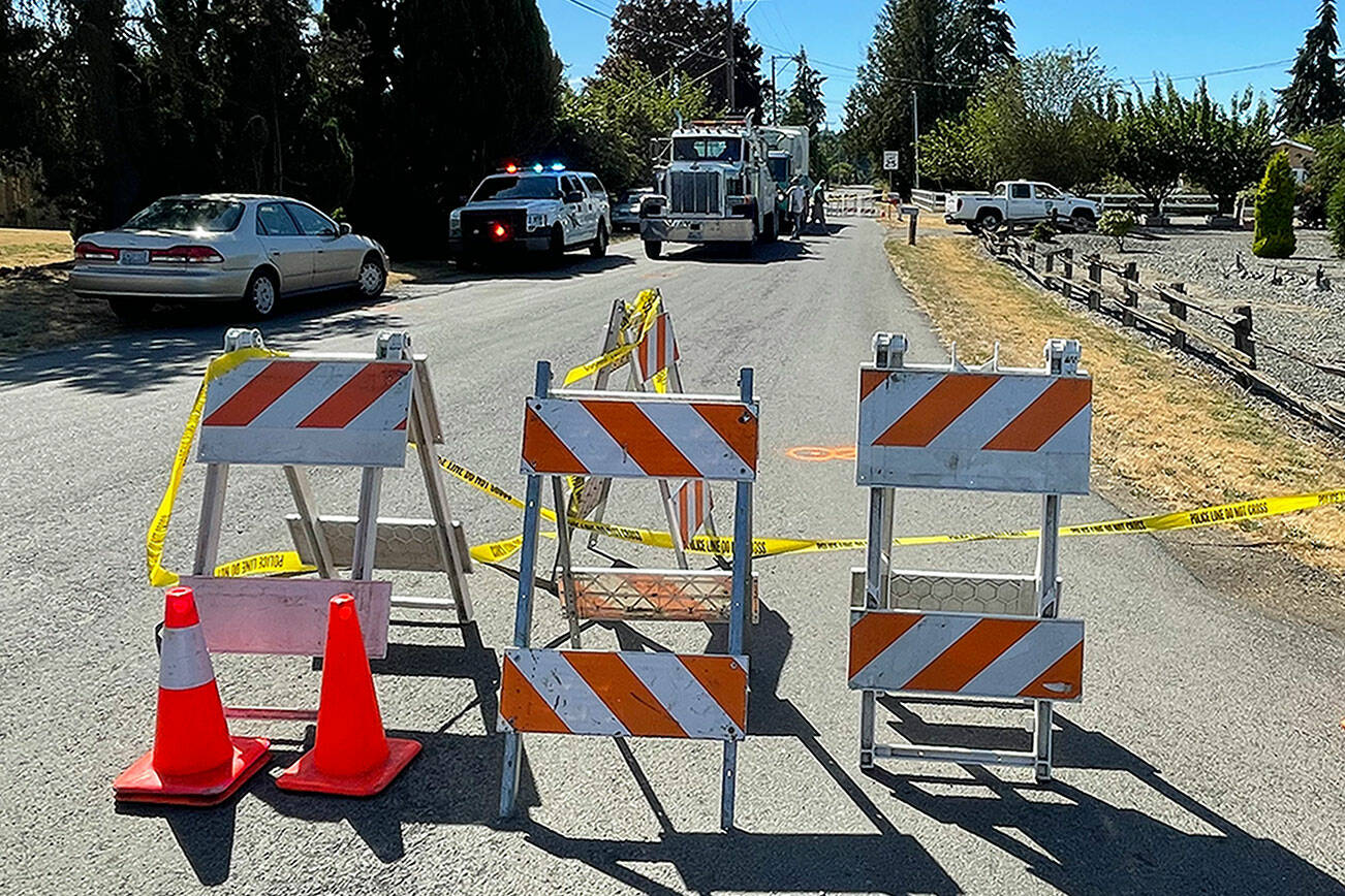 Matthew Nash/Olympic Peninsula News Group

Access from River Road to West Silberhorn Road was closed for several hours Monday after a cyclist died after being struck by a garbage truck.