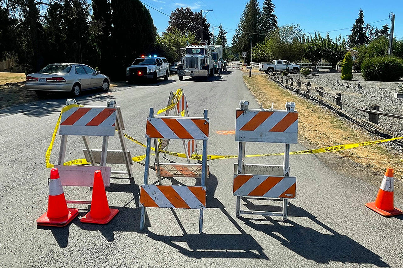 Access from River Road to West Silberhorn Road was closed for several hours Monday after a cyclist died after being struck by a garbage truck. (Matthew Nash/Olympic Peninsula News Group)