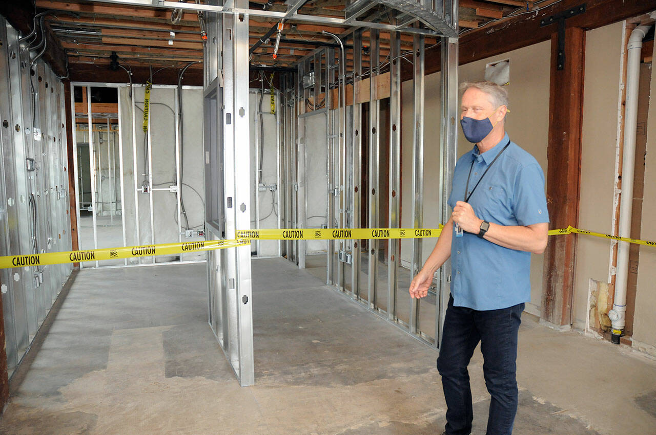 Dr. Michael Maxwell, CEO of the North Olympic Healthcare Network, conducts a short tour of the organization’s future Eastside Health Center at 1026 E. First St. in Port Angeles during an open house on Saturday. The clinic, located in the former Edna’s Place building, will house medical services and administrative offices with an opening scheduled for late December. (Keith Thorpe/Peninsula Daily News)