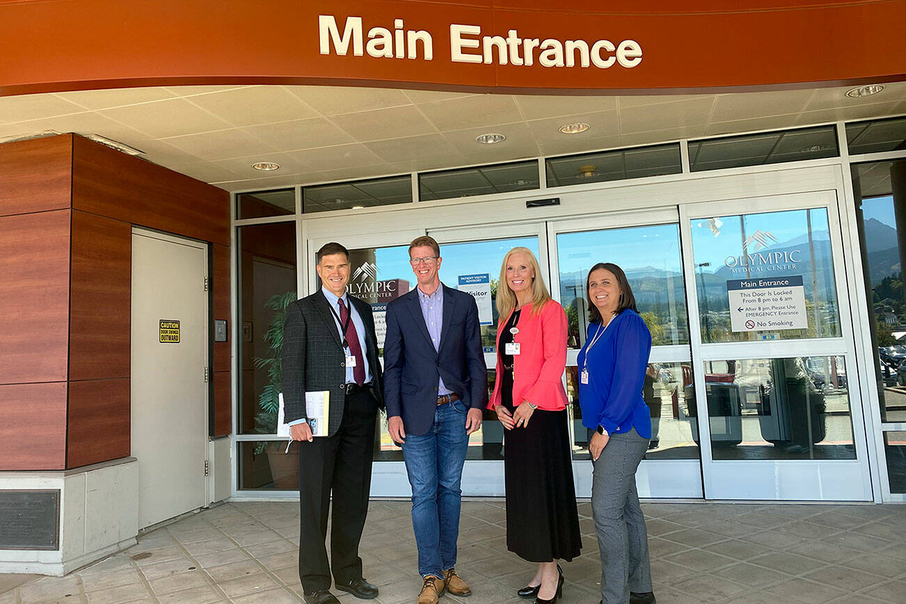 U.S. Rep. Derek Kilmer, second from left, tours Olympic Medical Center on Monday, hearing from hospital leadership CEO Darryl Wolfe, left of Kilmer; and, to the right, Human Resources Manager Jennifer Burkhardt and Communications Manager Bobby Beeman. (Ken Park/Peninsula Daily News)
