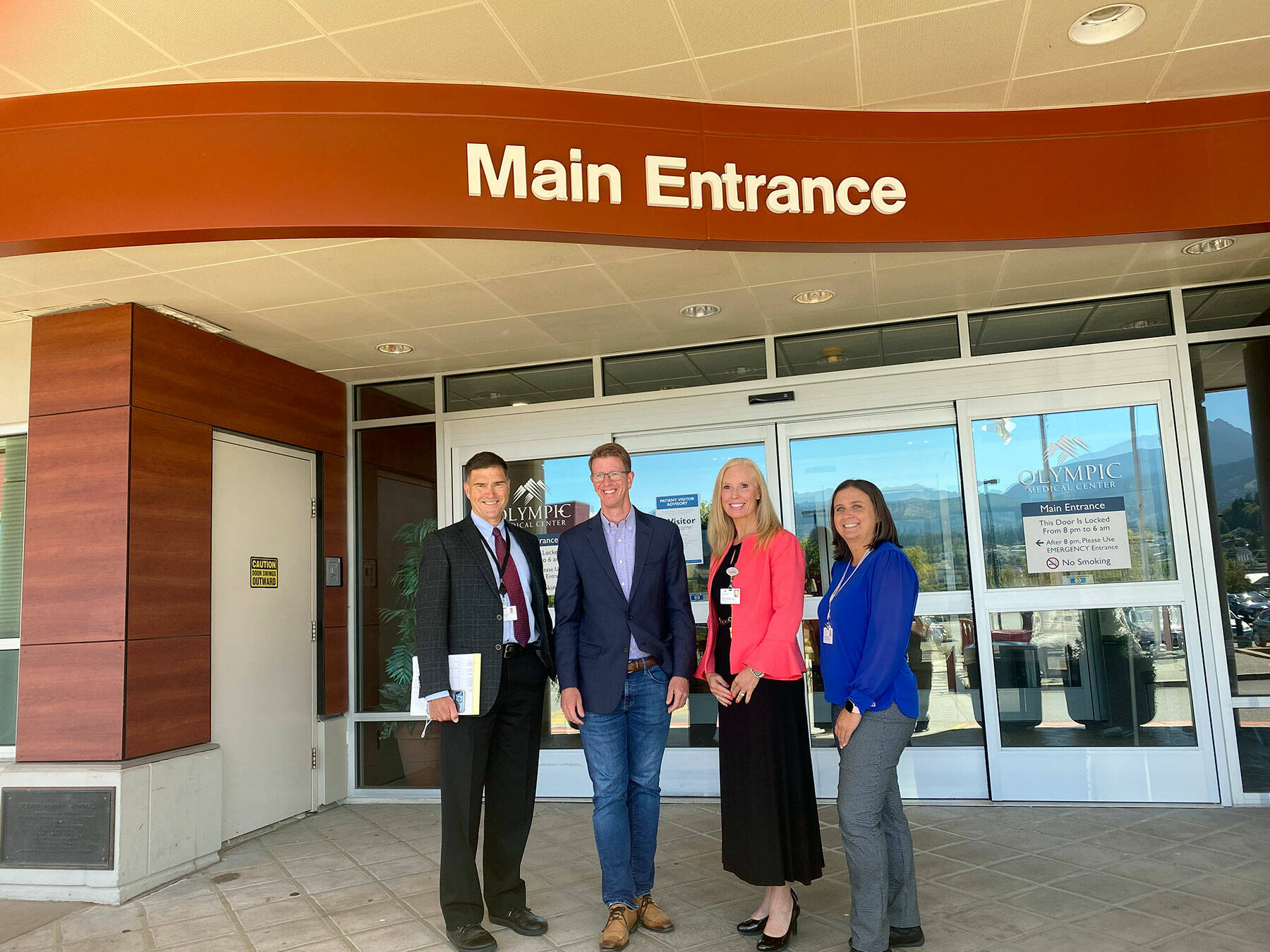 U.S. Rep. Derek Kilmer, second from left, tours Olympic Medical Center on Monday, hearing from hospital leadership CEO Darryl Wolfe, left of Kilmer; and, to the right, Human Resources Manager Jennifer Burkhardt and Communications Manager Bobby Beeman. (Ken Park/Peninsula Daily News)