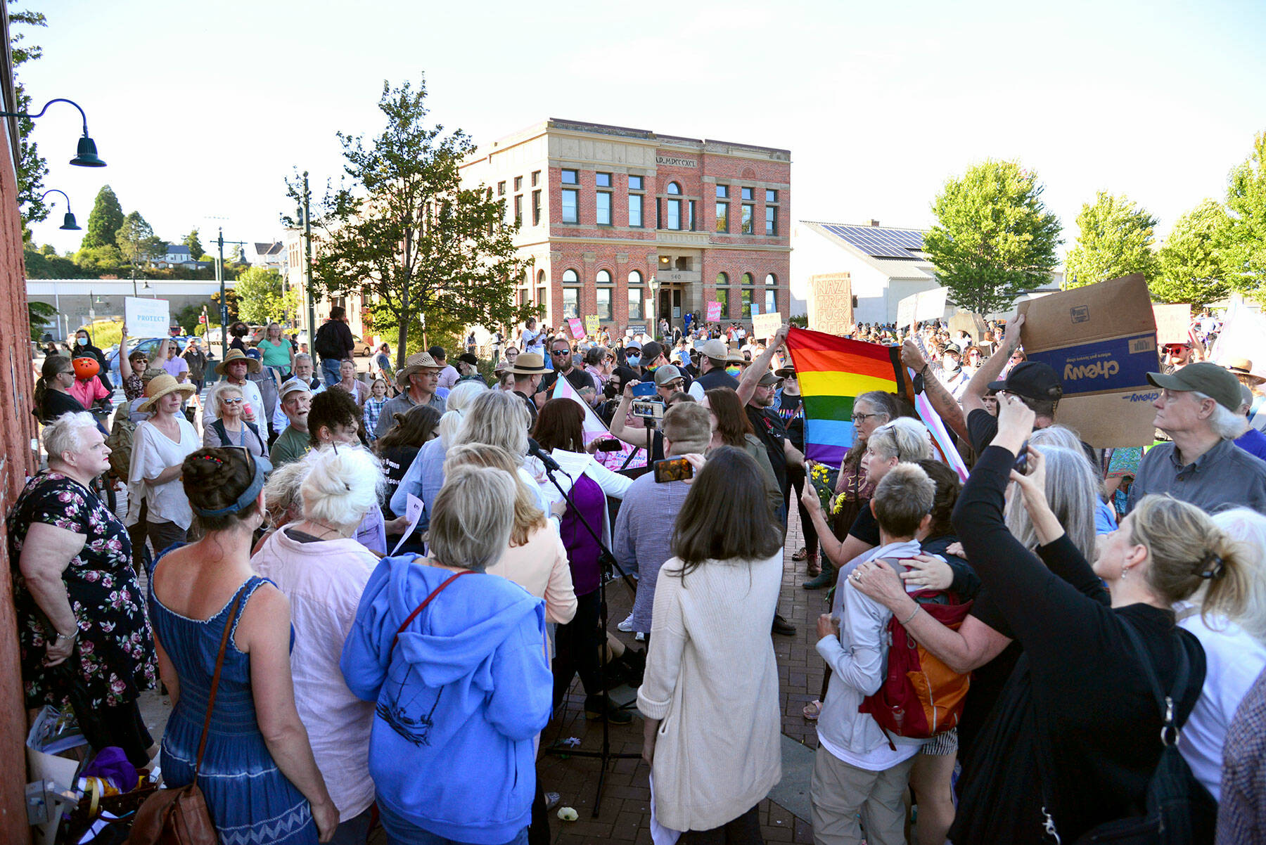 Hundreds of people gathered in downtown Port Townsend on Monday, mostly to support the policy of allowing transgender people to use the bathroom of their choice, but small scuffles broke out between protester groups, and one man was arrested. (Peter Segall / Peninsula Daily News)