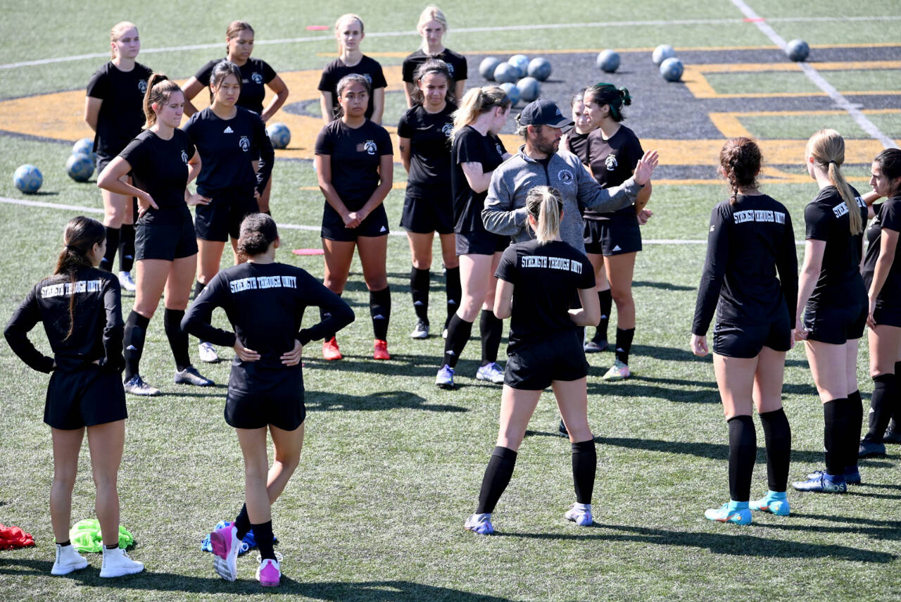 Coach Kanyon Anderson works with members fo the Peninsula College womens soccer team at a practice earlier this month. The women are defending NWAC champions. (Photo courtesy of Peninsula College)