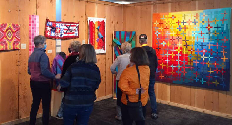 Submitted photo / Attendees of the North Olympic Fiber Arts Festival fiber arts exhibition get an up-close look at artists’ work in 2021.