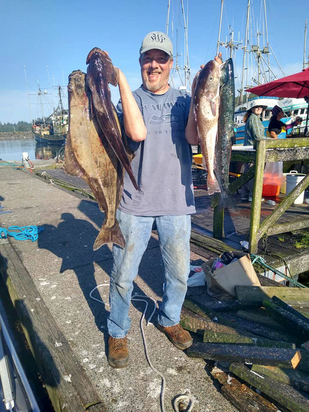 Federal Way angler James Tift had a mess of success fishing offshore at Swiftsure Bank in Marine Area 4 (Neah Bay) on Thursday. Tift limited on hatchery coho while catching a halibut, a lingcod and rockfish.