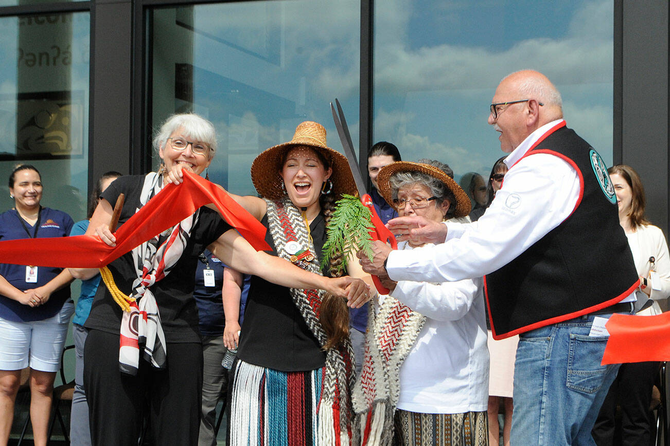 To usher in the Jamestown S'Klallam Tribe's Healing Clinic, from left, Dana Ward, tribal council member; Loni Greninger, council vice-chair; Elaine Grinnell, elder, and W. Ron Allen, chairman, cut the ribbon on the facility that aims to help locals overcome opioid use disorder. (Matthew Nash/Olympic Peninsula News Group)