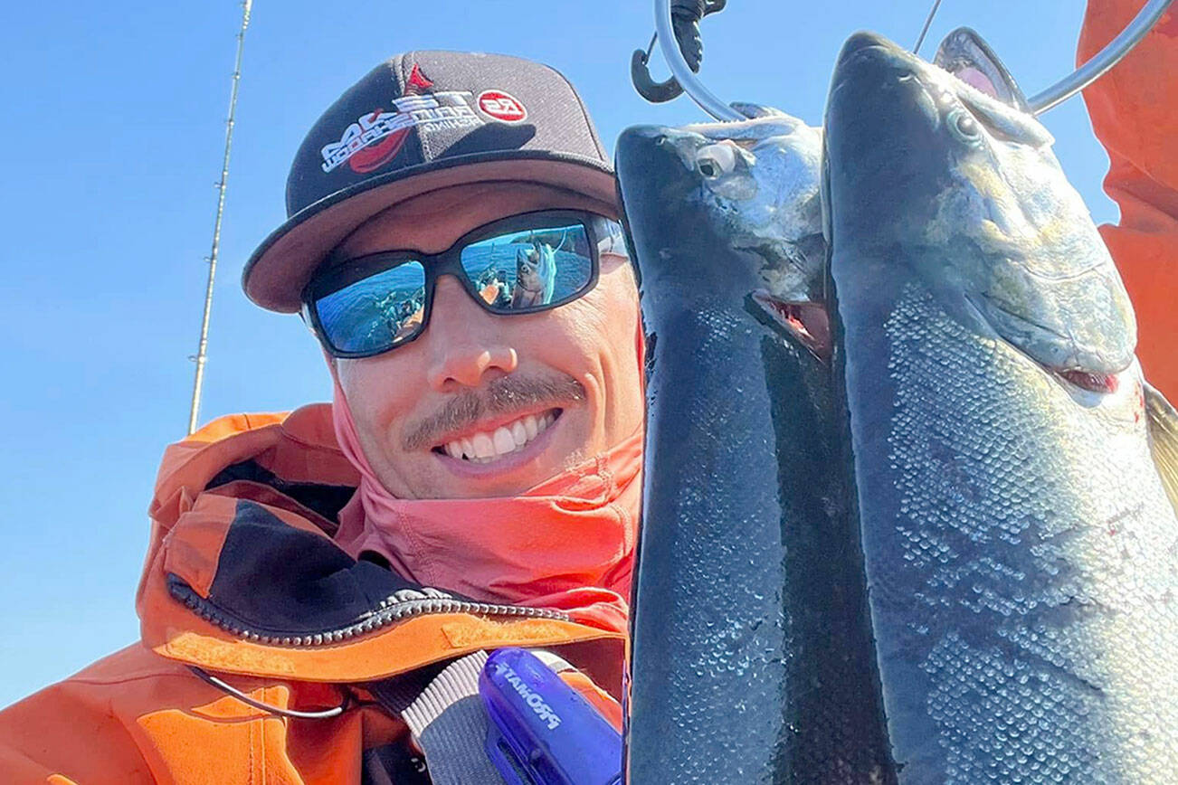 Sequim's Kyle Kautzman enjoyed an excellent day of fishing near Salt Creek on his Old Town kayak. Kautzman caught a pair of good-sized hatchery coho after spending time releasing a number of kings and lingcod.