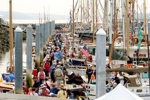 Crowds jam the north dock at the 45th Wooden Boat Festival at Point Hudson in Port Townsend on Saturday. (Steve Mullensky/for Peninsula Daily News)