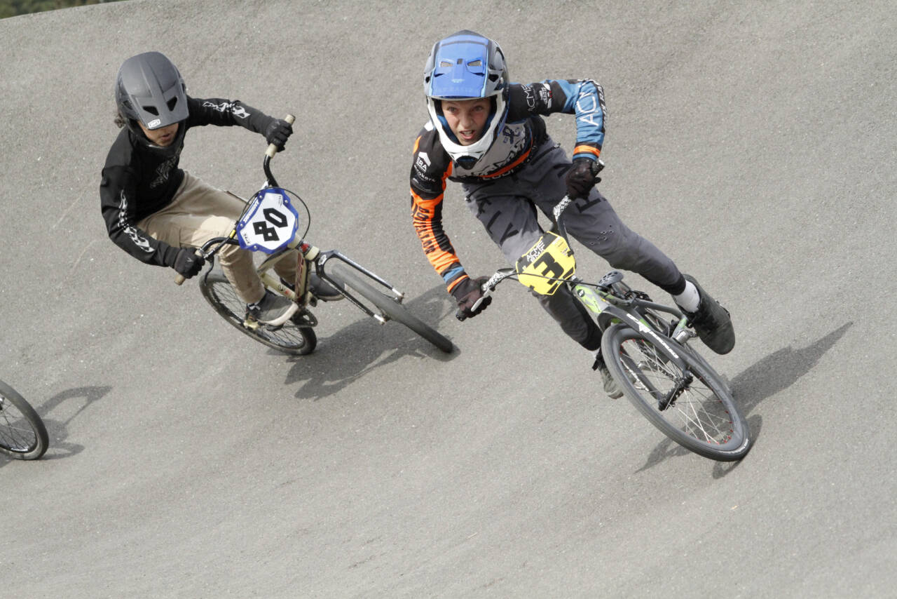 A pair of riders take on the high bank of the Lincoln Park BMX track Sunday at the USA BMX Pacific Northwest Gold Cup finals. (Courtesy of USA BMX/Craig Barrette)