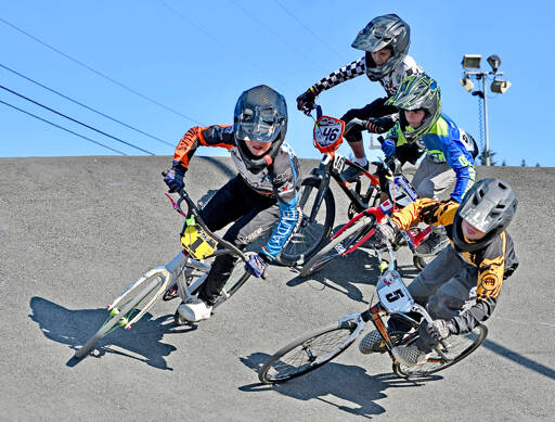 More than 500 racers from 11 states competed all weekend at the USA BMX Pacific Northwest Gold Cup finals hosted by the Lincoln Park BMX Park. Here, Nixon Thompson (1) of Saratoga Springs, Utah, Jett Fishbaugh (46) of Tacoma, Colton Hackett (1) of Arlington and Sébastien White (5) of Gillette, Wyo., race in the 9 expert class. Winning this class for the second time in two days was Braden Gray of Port Angeles. (Jay Cline/Lincoln Park BMX)