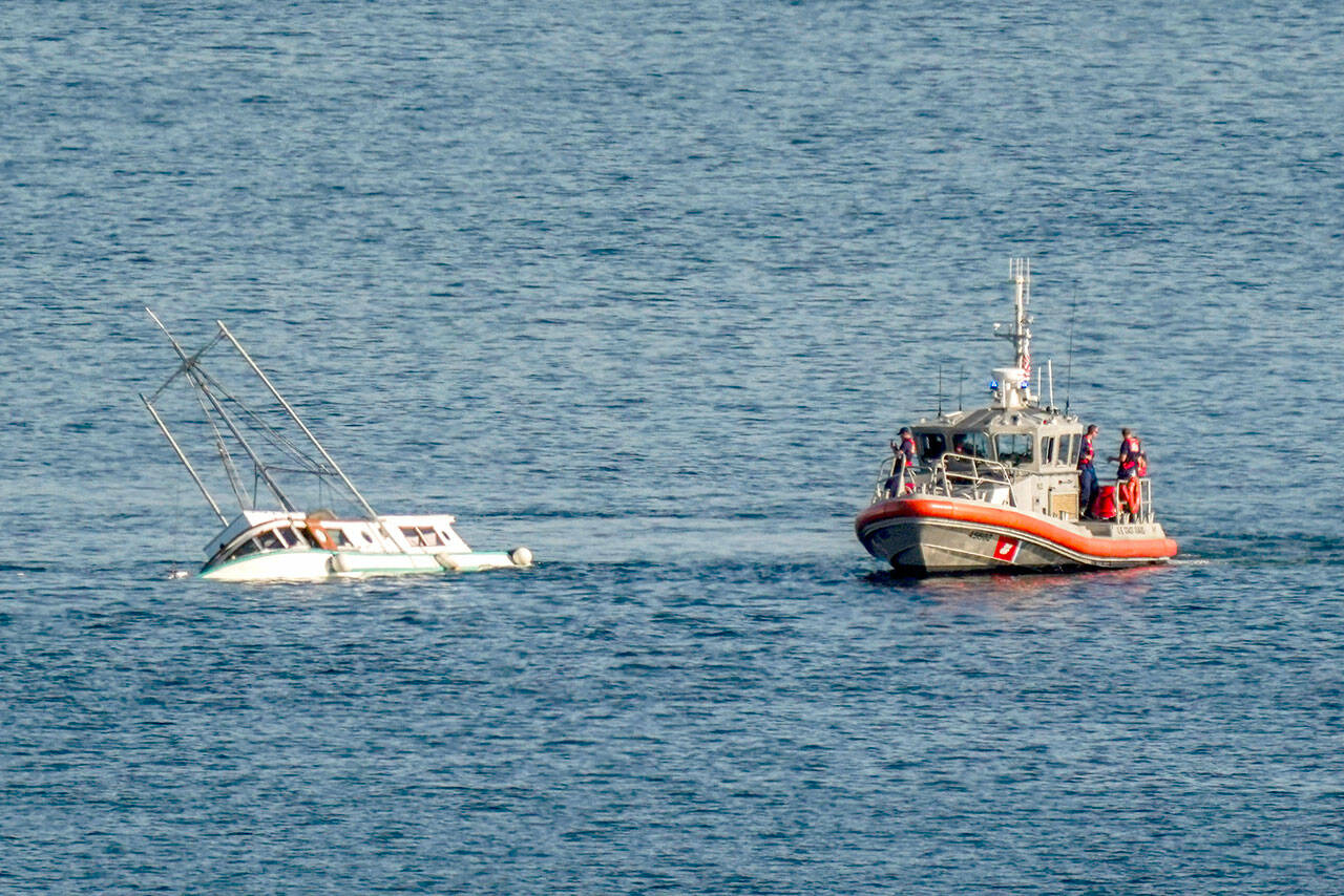 The U.S. Coast Guard and East Jefferson Fire and Rescue assisted a fishing trawler that began taking on water shortly after 3:30 p.m. Thursday in Port Townsend Bay. No more information was available Thursday afternoon. (Steve Mullensky/for Peninsula Daily News)