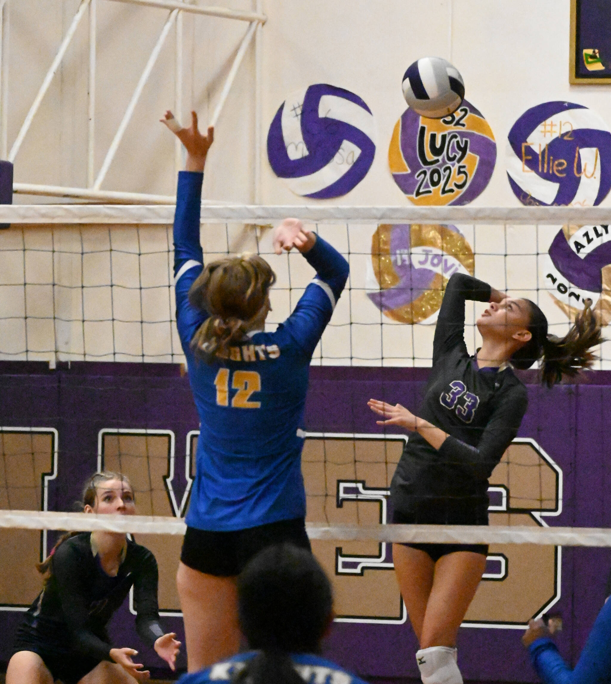 Michael Dashiell/Olympic Peninsula News Group Sequim’s Arianna Stovall, right, looks to hit past Bremerton’s Helene Rode in a three-set Sequim win on Sept. 29.