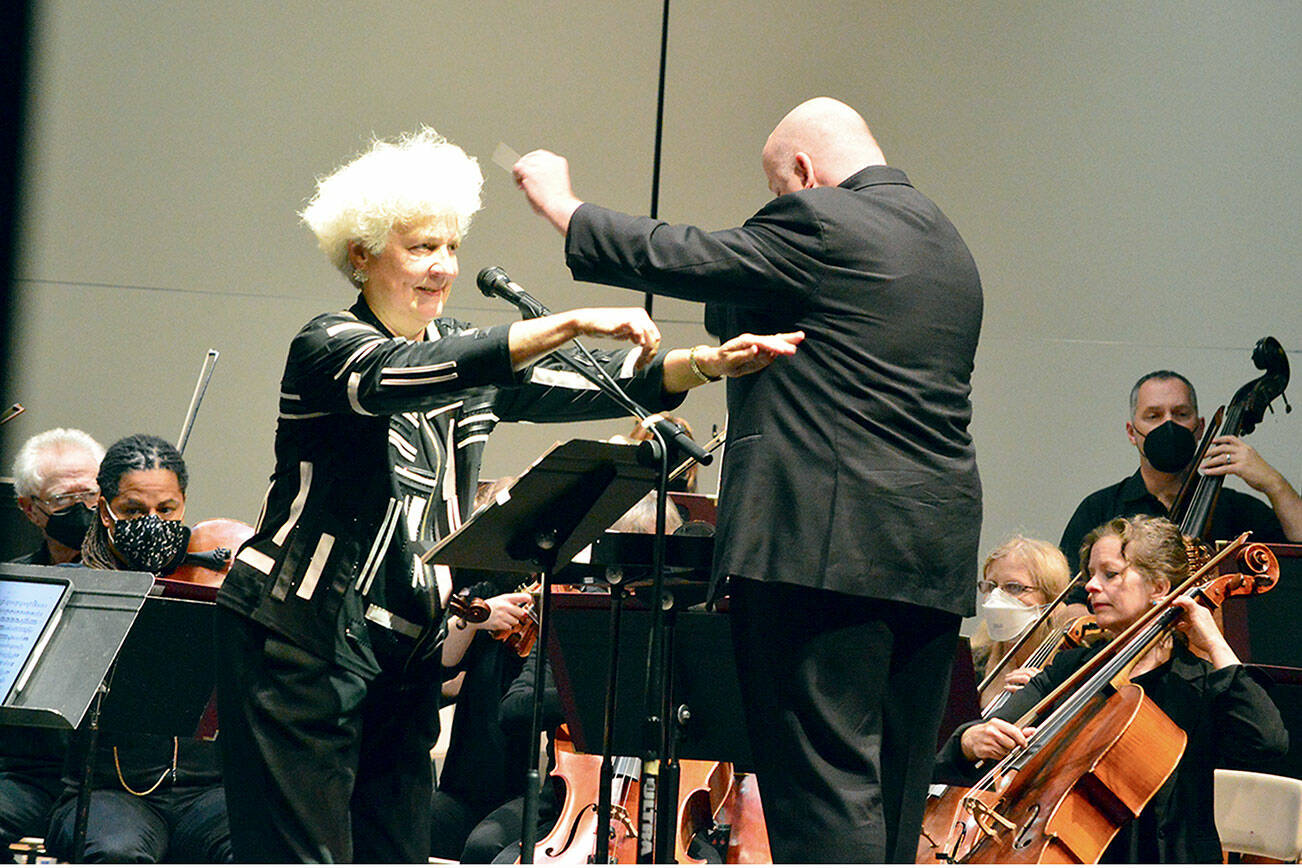 In the Port Angeles Symphony’s season-opening Family Pops concert Saturday, Lisa Bergman narrates — and demonstrates a cat walking through the forest — in Prokofiev’s “Peter and the Wolf,” with music director Jonathan Pasternack conducting beside her. The next concert of the season will be Chamber I: Stravinsky’s Soldier Tale on Oct. 14-15. Tickets and more information are available at http://portangelessymphony.org. (Diane Urbani de la Paz/For Peninsula Daily News)