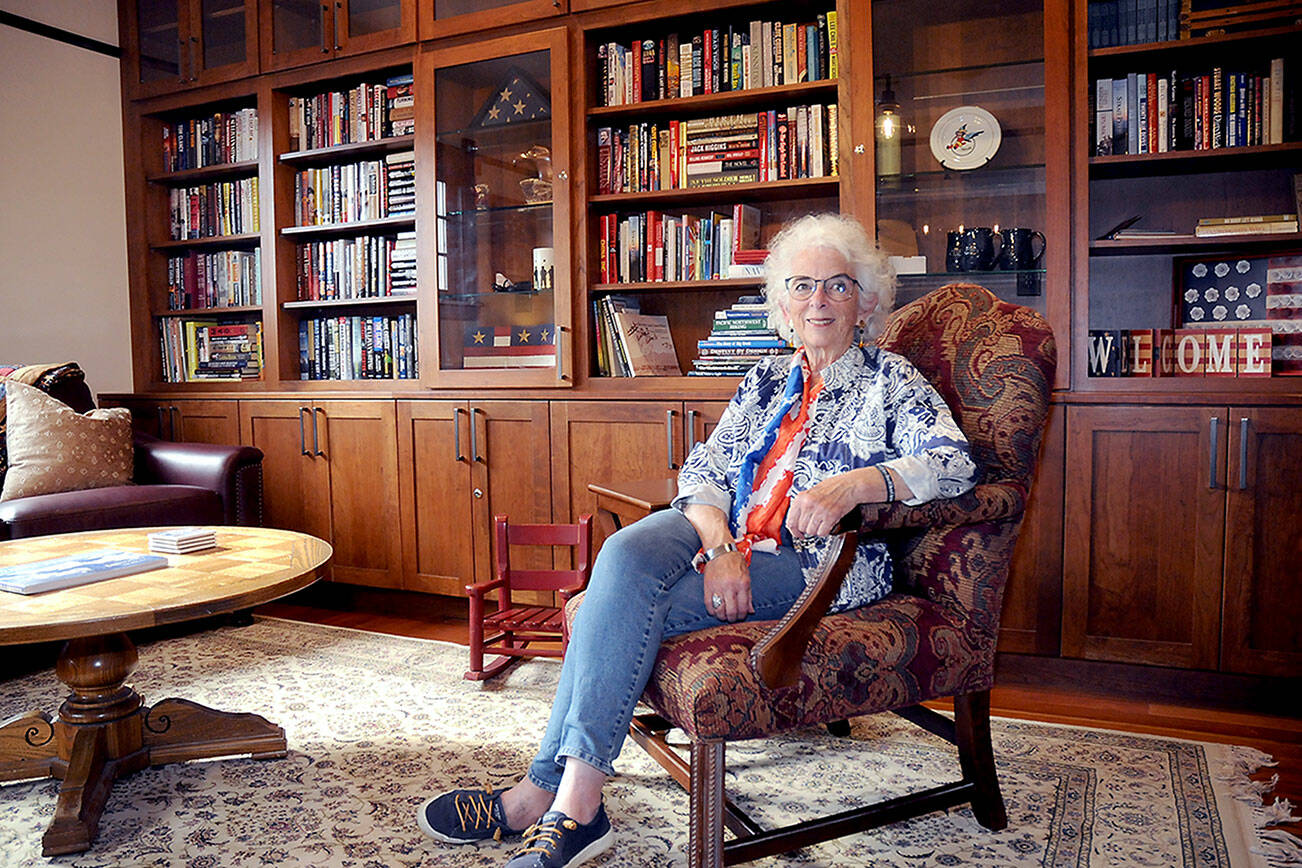 Betsy Reed Schultz, head of the Captain Joseph Foundation, sits in the library of the Captain Joseph House in Port Angeles as the respite home for Gold Star families prepares for its first guests this weekend. (Keith Thorpe/Peninsula Daily News)
