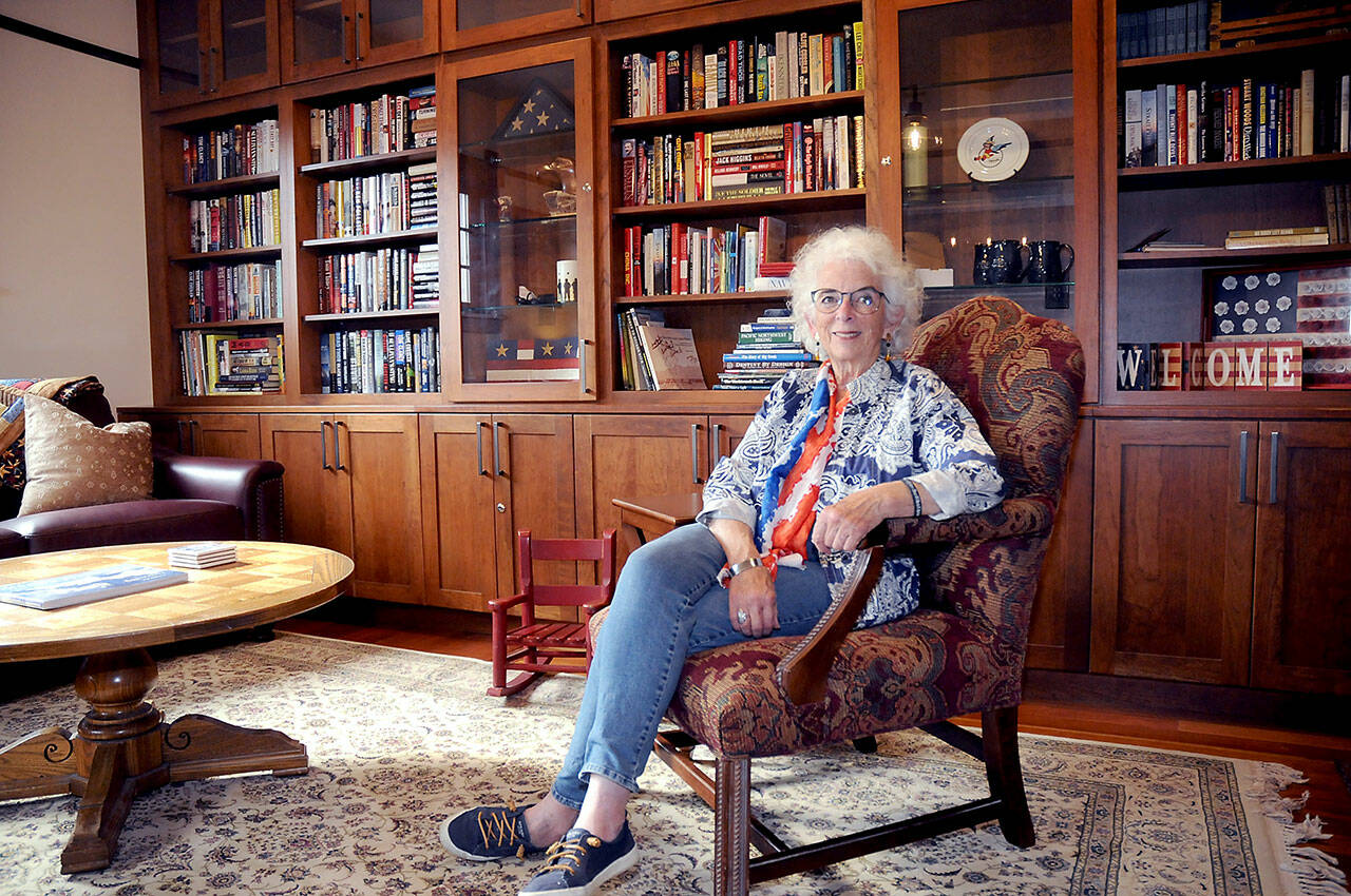 Betsy Reed Schultz, head of the Captain Joseph Foundation, sits in the library of the Captain Joseph House in Port Angeles as the respite home for Gold Star families prepares for its first guests this weekend. (Keith Thorpe/Peninsula Daily News)