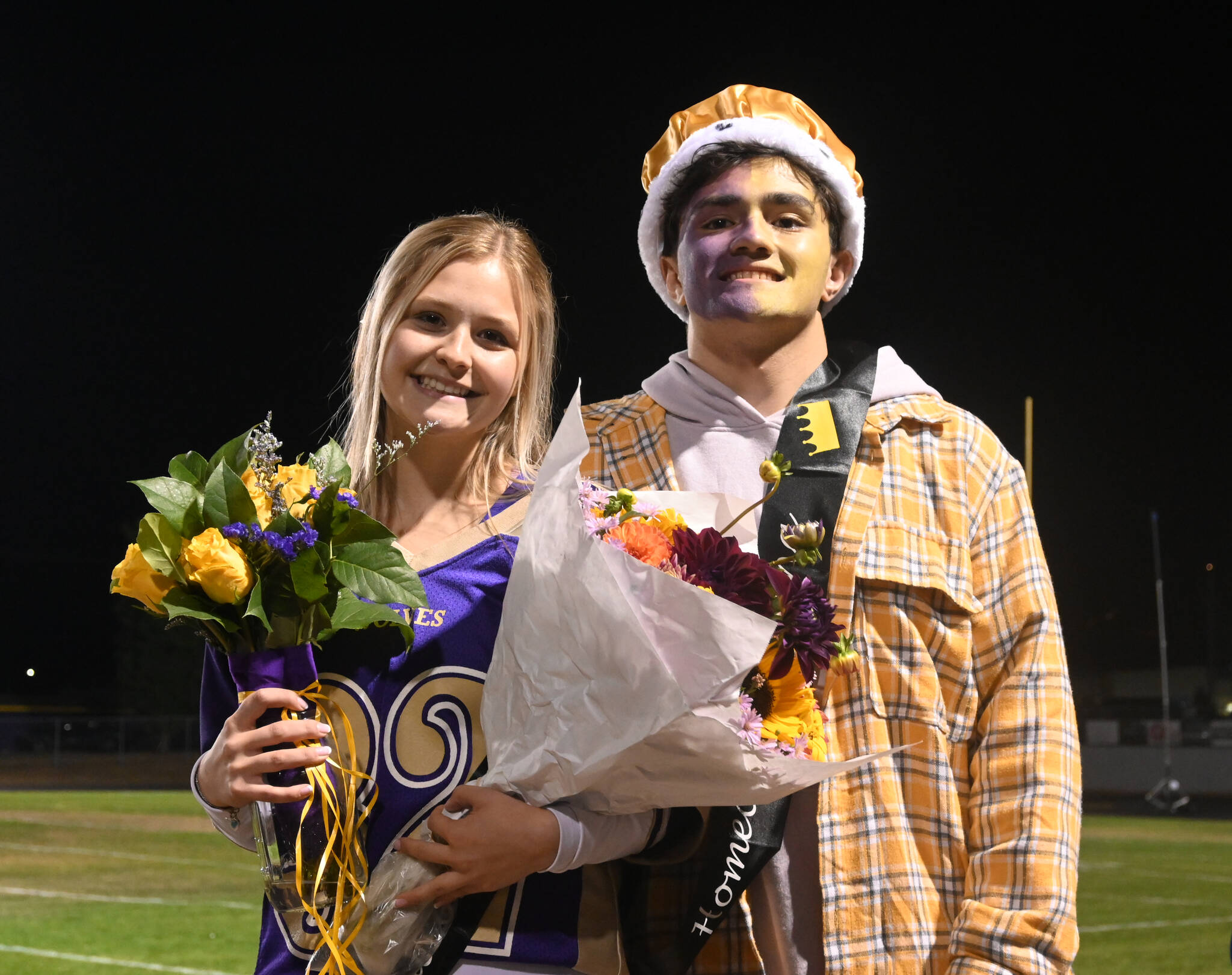 Sequim High’s 2022 Homecoming Queen and King, Claire D’Amico and Aaron Tolberd, are all smiles at halftime of the SHS football game on Sept. 30.