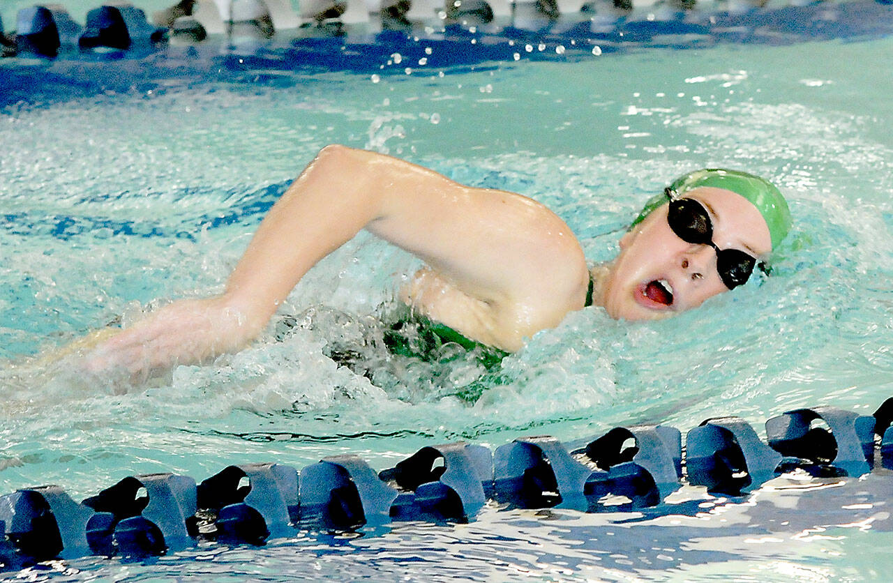 KEITH THORPE/PENINSULA DAILY NEWS Port Angeles’ Mackenzie DuBois swims in the 500-yard freestyle race during Wednesday’s meet against Sequim at the Shore Aquatic Center in Port Angeles.