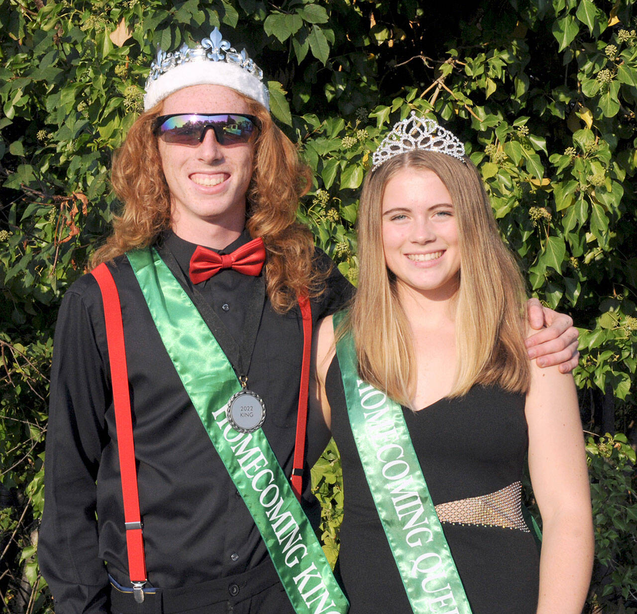 Port Angeles High School senior homecoming King and Queen Jack Gladfelter and Lily Halberg prepare to ride in their school’s homecoming parade after being crowned on Friday. The pair presided over the Port Angeles Roughriders’ 28-9 loss to the Bremerton Knights during Friday’s football game at Port Angeles Civic Field. (Keith Thorpe/Peninsula Daily News)