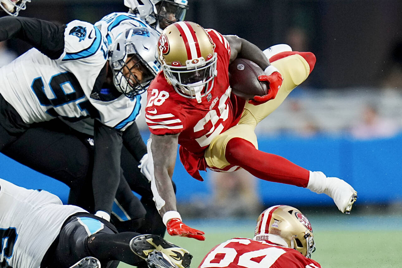 San Francisco 49ers running back Tevin Coleman runs against the Carolina Panthers during the second half an NFL football game on Sunday, Oct. 9, 2022, in Charlotte, N.C. (AP Photo/Rusty Jones)